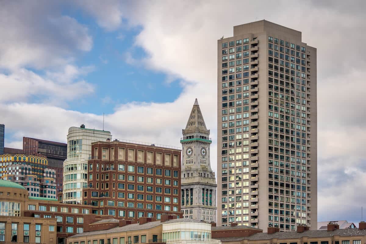 boston-skyline-and-custom-house-clock-tower-bost-2023-11-27-04-59-01-utc (1)